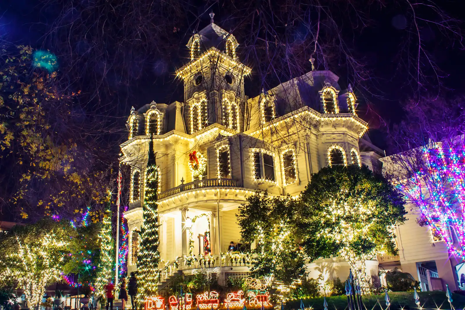 The Governor's Mansion in Sacramento decorated with warm white and multicolor Christmas lights by The Christmas Light Pros